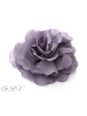 Pilkšvai violetinės spalvos gėlė - segė